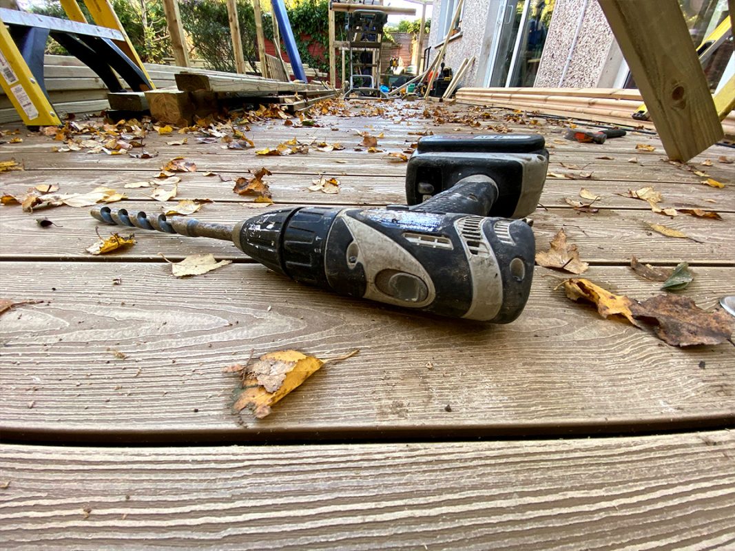 Zimní zahrada z kompozitních terasových prken Honey Teak